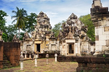 Сourtyard and libraries of 11th-century ancient Khmer temple Prasat Sdok Kok Thom built of red sandstone and laterite in Sa Kaeo province of Thailand
