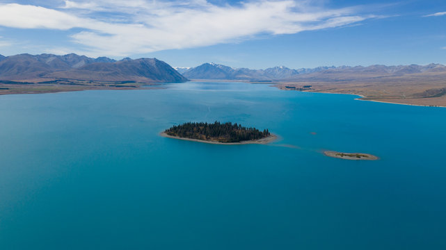 Lake Tekapo and Motuariki Island, Motuariki island from above, aerial shot of Lake Tekapo and Motuariki Island, Mackenzie Country, South Island New Zealand