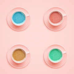 Four coffee cups of different colors. Minimal style