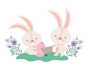 rabbits with wheelbarrow and easter egg icon