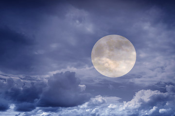 Naklejka na ściany i meble The mystical full Moon in the clouds. Landscape of night nature at sunset. 