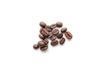 Roasted coffee beans isolated on white background. Close-up.