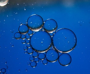 Colorful oil drops on a water surface ideal for abstract background