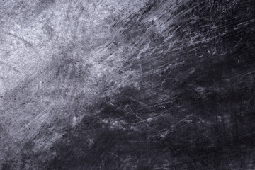 Random and messy horizontal chalk textured background over vintage blackboard - with copy space
