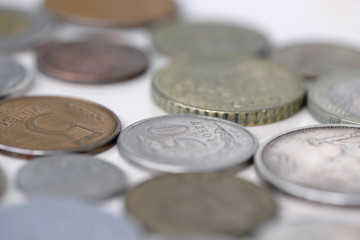 Coins of different countries close-up