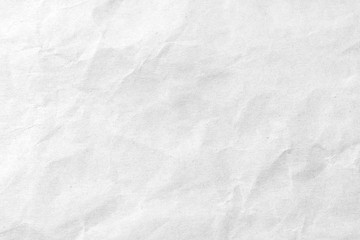 Plakat White crumpled paper texture background. Close-up.