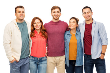 Obraz premium friendship and people concept - group of smiling friends over white background