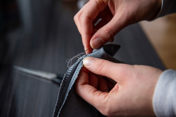 Close up of woman hand sewing
