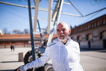 Two mature men running