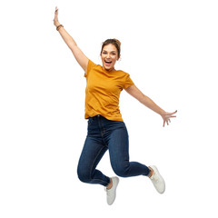 Fototapeta motion, freedom and people concept - happy young woman or teenage girl jumping over white background obraz