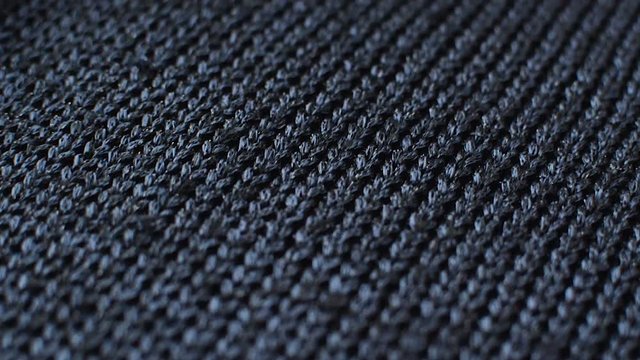 The texture of the fabric. blue knitted texture. Close-up. Can be used as a background. Hd