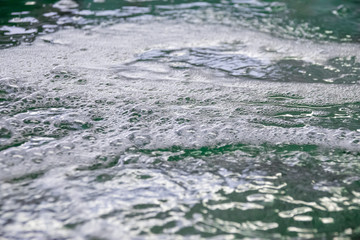 The bubbling water surface