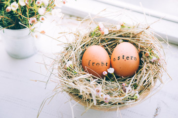Easter eggs with Frohe Ostern text stamp