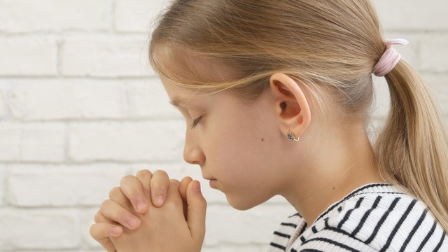 Child Face Praying Before Eating, Kid in Kitchen, Girl Portrait Meditating