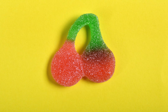 Cherry Jelly Candy On Yellow Background