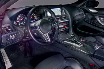 Obraz na płótnie Canvas Supercar luxury interior - Carbon fibre