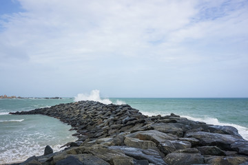 Stone pier in the Bay of Bengal. City Kanyakumari, India