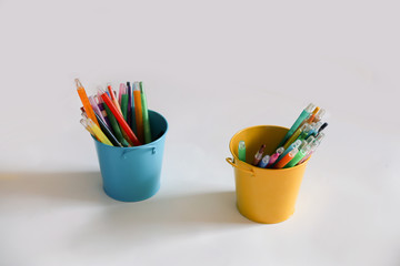 educational elements for preschool students crayons and pencils in a holder