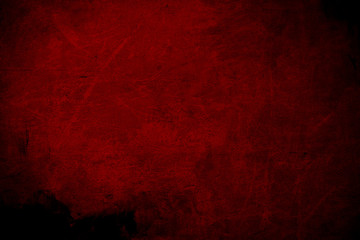 Old red scratched wall, grungy background or texture
