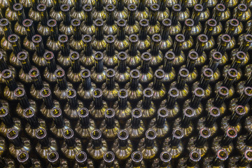 Wine bottles background, winemaking process to preparing wine for bottling in a winery, top view of...