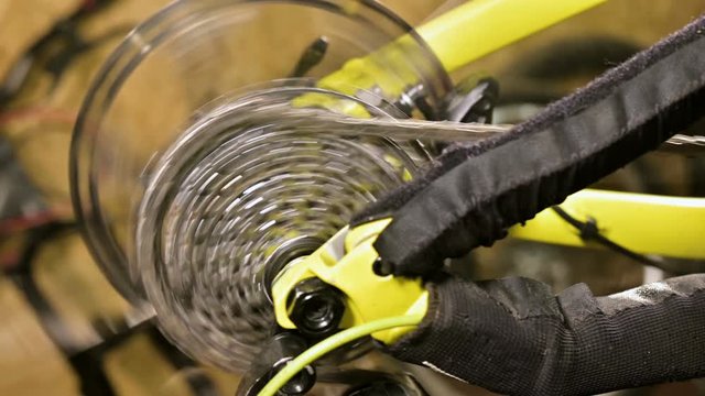 Close-up of the cycling star gear knot when shifting gears in a bicycle repair shop. Bicycle repair