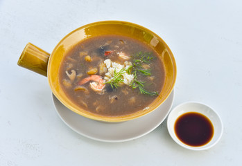 Braised Fish Maw in Red Gravy with Crab and shrimp in bowl
