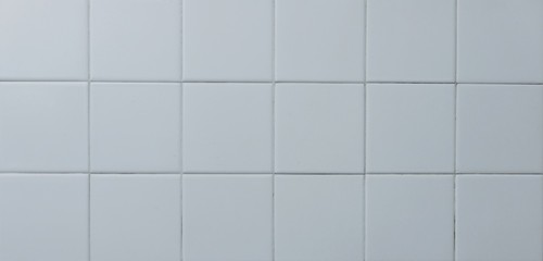 white ceramic wall tiles texture in the bathroom for background