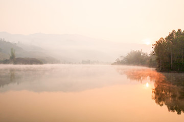 Fototapeta na wymiar Pa Khong Lake in the morning mist.