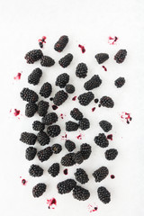 Top View of Blackberries Scattered on White Background