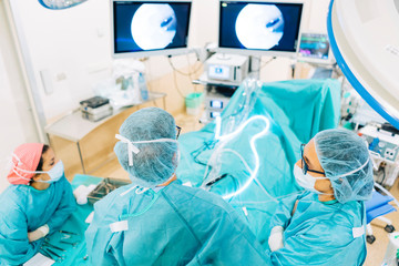 Team of surgeons operating in the hospital