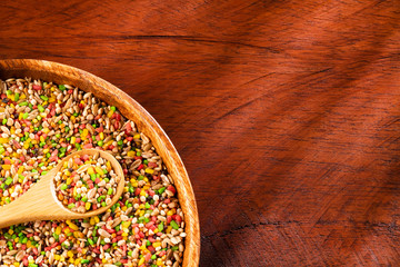 Mixture for birds - Canary and parakeet. Wood background