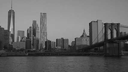 black and white view of east river and Brooklyn Bridge and Manhattan, New York City, USA
