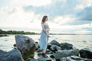 Nice girl in prom dress outdoors portrait