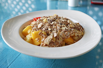 A Bowl of Cereal and Fresh Fruits