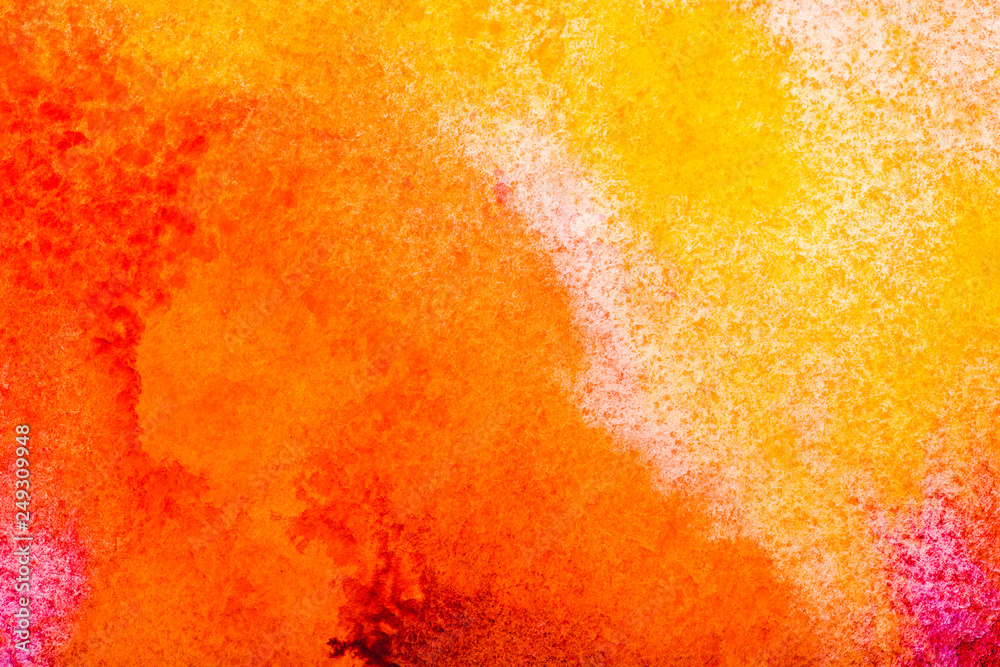 Wall mural top view of yellow and orange watercolor spills with copy space