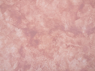 Fototapeta premium Salmon, pale red, brown concrete wall background texture