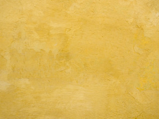 Yellow concrete wall background texture
