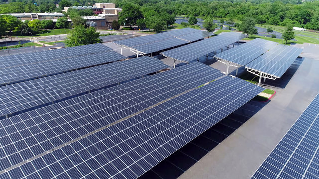aerial view of solar panels in parking