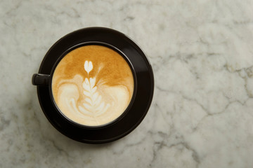 Latte art, black coffee cup