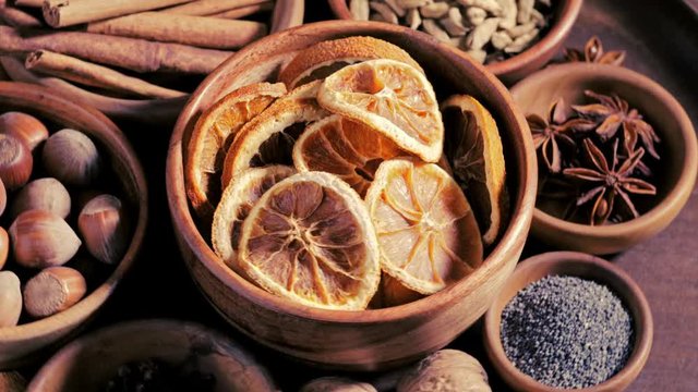 Spices in bowls spinning on the table