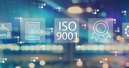 ISO 9001 with blurred city abstract lights background