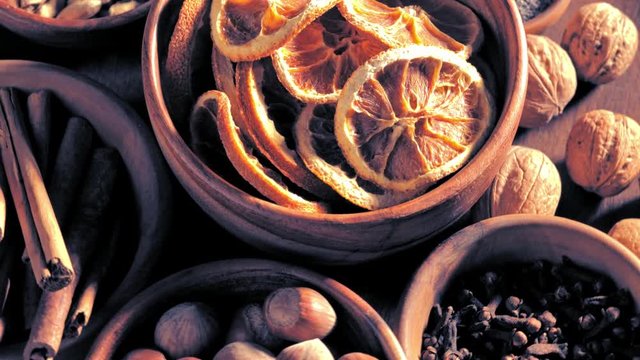 Mix of spices in bowls spinning on the table