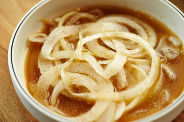 Sliced onion with sauce 