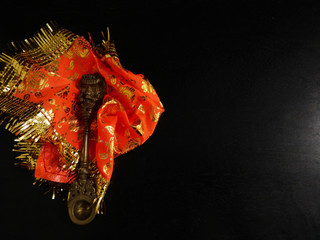 lord ganesha with orange cloth