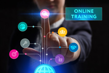 The concept of business, technology, the Internet and the network. A young entrepreneur working on a virtual screen of the future and sees the inscription: Online training