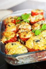 Stuffed pepper with chicken fillet, brown rice, vegetables and herbs. A dietary dish.