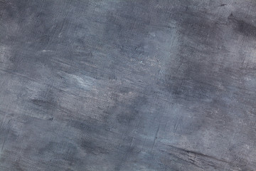 Canvas coated with aqua blue and grey acrylic paint with texture strokes. Abstract textural background.