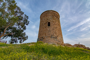Fototapeta na wymiar Old stone tower for surveillance in Mazarron, Spain