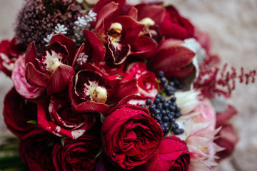 Pink rose flowers bouquet on light stone background