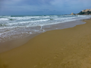 Tourist destination, small Italian village Sperlonga in winter season, landscape with sandy beach